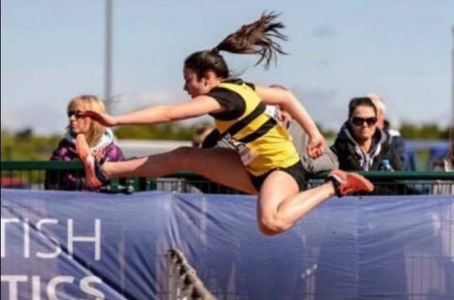 Millie Aitken hurdles